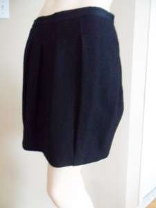 Celebrate individual style with this must have wool pleated skirt