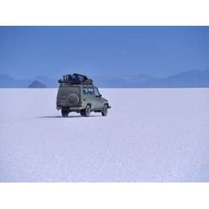  across the Crusted Salt of the Salar De Uyuni, the Largest Salt Flat 