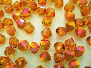 12 Astral Pink Swarovski Crystal Beads Bicone 5328 6mm  