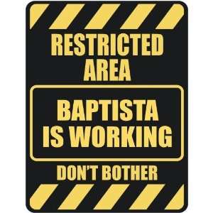   RESTRICTED AREA BAPTISTA IS WORKING  PARKING SIGN