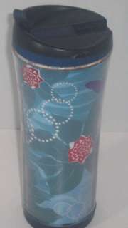   Flowers and Butterflies Travel Tumbler   Good Used Condition