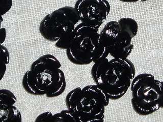 Sweet little black aluminum/metal rose flower beads. These measure 