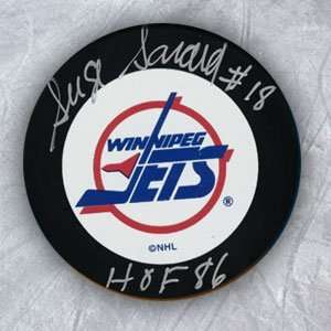  SERGE SAVARD Winnipeg Jets SIGNED Hockey PUCK Sports 