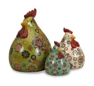   Made of porcelain with dots of flowers accenting each chicken/rooster