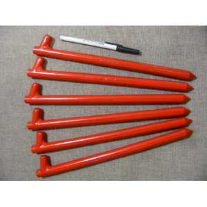   long Orange metal tent pegs, tent anchors or stakes 