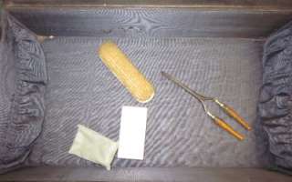 Beautiful antique manicure set in leather suitcase. The set is in 