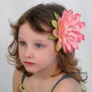  flower clip features an extra large pink water lily flower that