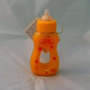  Magic Baby Bottle   Orange Juice Toys & Games