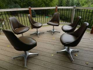 Mid century modern set of 6 vinyl chairs on heavy metal swivel bases 