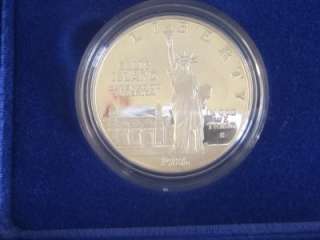 1986 S Silver Proof Liberty Dollar and 1986 S Half Dollar 