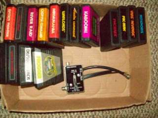 ATARI 2600 game system, new trak ball, 2 extra controllers, 16 games 