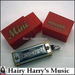 This four hole mini harmonica plays a full scale