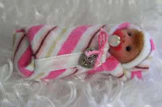 OOAK Baby Bundles head is hand sculpt out of polymer clay and blushed 