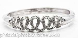 Nolan Miller silver ribbon crystal bangle bracelet  